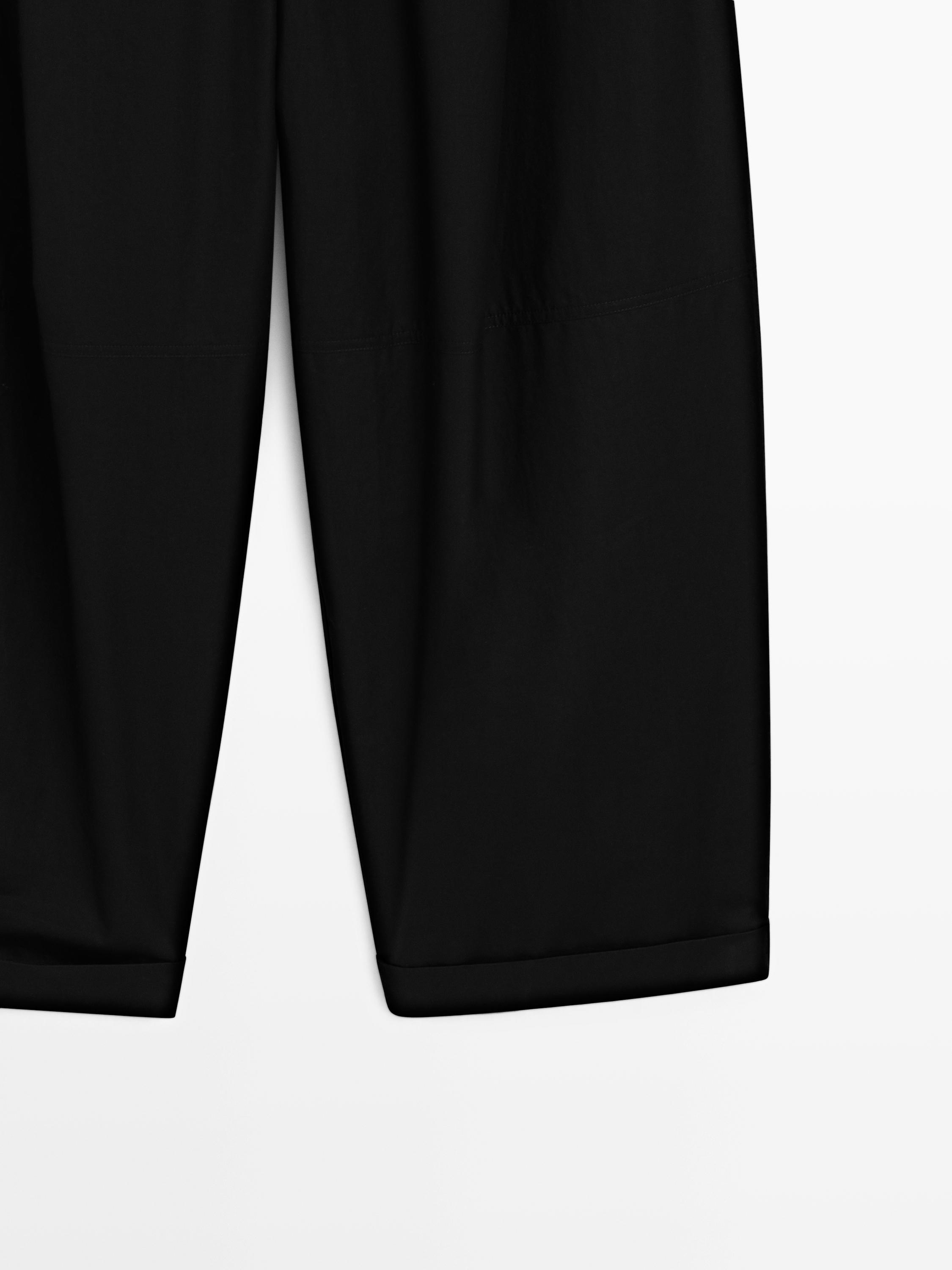 Barrel fit trousers with turn-up detail